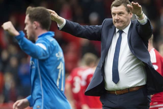 Tommy Wright's a happy man as St Johnstone keep their European chances alive. Picture: SNS