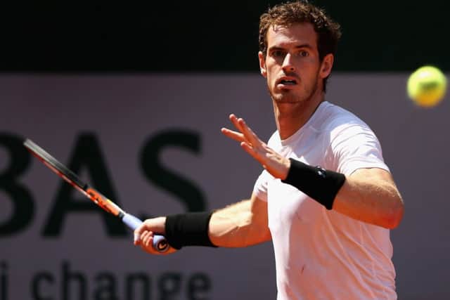 Andy Murray prepares to play a forehand as he warms up on day one of the 2015 French Open. Picture: Getty