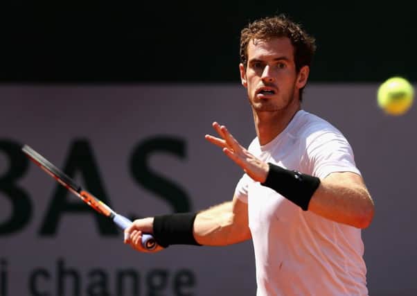 Andy Murray prepares to play a forehand as he warms up on day one of the 2015 French Open. Picture: Getty
