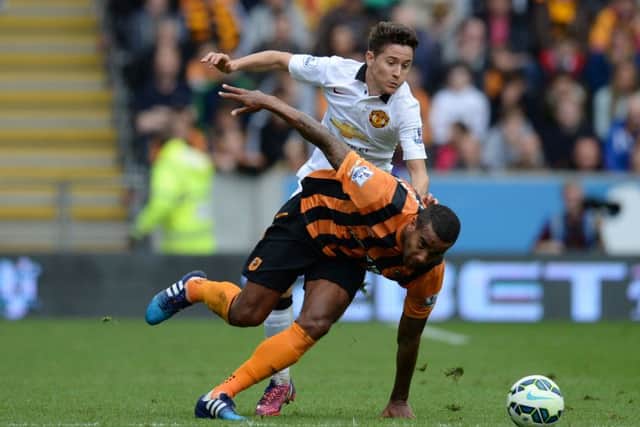Ander Herrera tangles with Tom Huddlestone during the scoreless draw. Picture: Getty