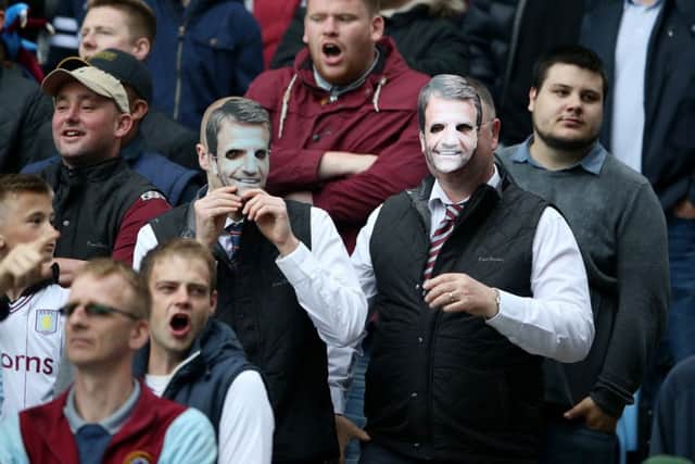 Villa fans donned Tim Sherwood masks and outfits for the final match of the season. Picture: PA