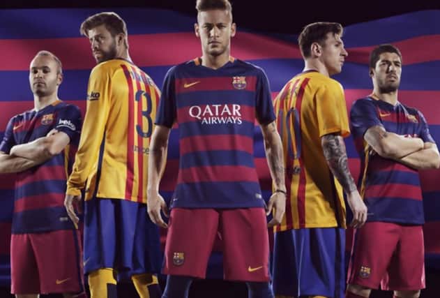 The new Barcelona home kit, as modelled by Andres Iniesta, Neymar and Luis Suarez, and the yellow away kit. Picture: Nike/Barcelona