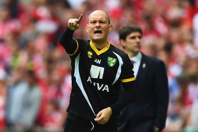 Alex Neil manager of Norwich City signals as Aitor Karanka manager of Middlesbrough looks on. Picture: Getty