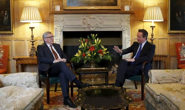 Jean-Claude Juncker, left, meets David Cameron at Chequers. Picture: PA