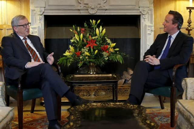 European Commission President Jean-Claude Juncker, left, meets Prime Minister David Cameron at Chequers. Picture: PA