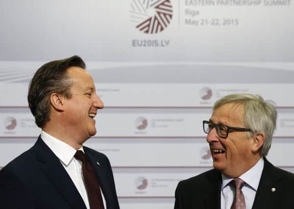 David Cameron and European Commission President Jean-Claude Juncker (right) at the Eastern Partnership summit in Riga. Picture: AP