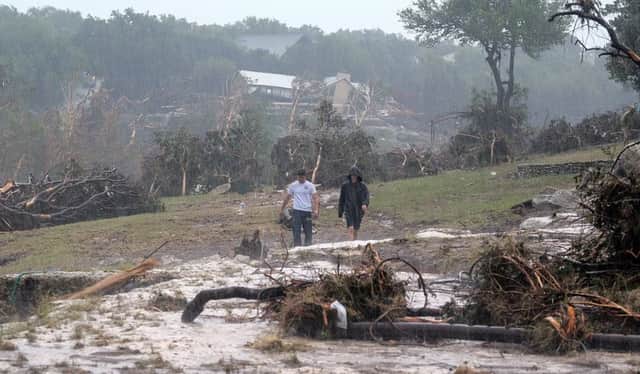 The scene of devastation where the holiday home in which the two families were staying was swept away. Picture: AP