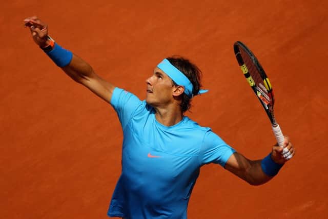 Defending champion Rafael Nadal serves during his straight-sets win over Quentin Halys. Picture: Getty