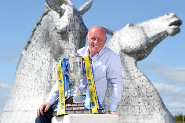 Falkirk manager Peter Houston with William Hill Scottish Cup. Picture: SNS
