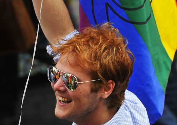 A reveller at 
Edinburgh's Gay Pride march on the Royal Mile. Picture: Ian Georgeson