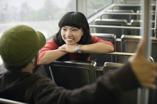Making eye contact and smiling at a stranger on the bus could be regarded by some people as an invitation to further interaction. Picture: Getty