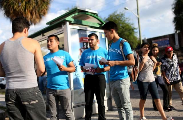 Activists speak to passers-by about the Texas judge's injunction. Picture: Getty