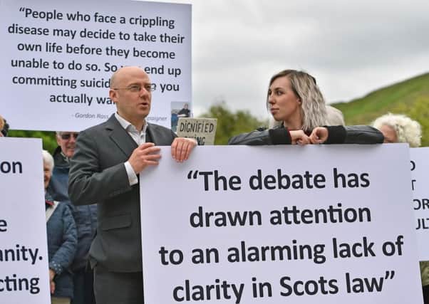 Patrick Harvie, co-convenor of the Scottish Green Party, and Francesca Kelsey join campaigners supporting the proposed legislation to allow assisted suicide in Scotland. Picture: Getty