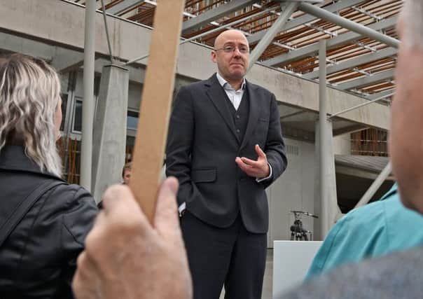 Patrick Harvie addresses supporters at Holyrood. Picture: Getty