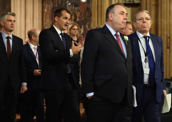 Alex Salmond leaves though the central lobby. Picture: Getty