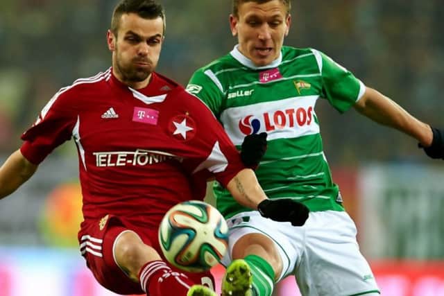 Rafal Janicki, right, in action against former Celtic loan striker Pawel Brozek as Lechia Gdansk take on Wisla Krakow. Picture: Getty