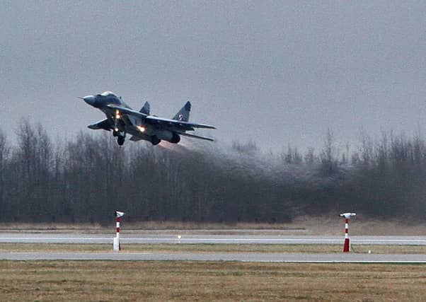 Despite the support of Nato forces, including this Polish Mig operating from Lithuania, the Baltic states are vulnerable to attack from Russia. Picture: Getty Images