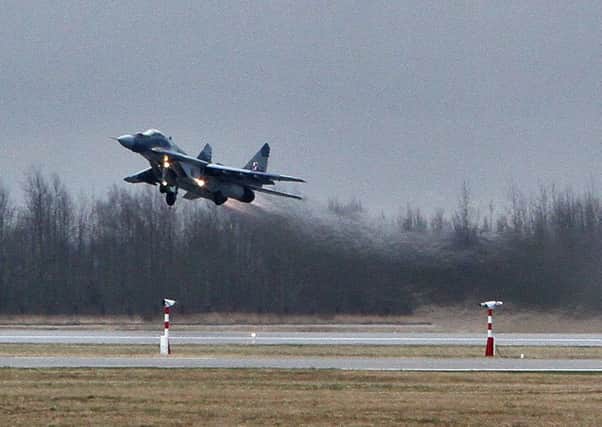 Despite the support of Nato forces, including this Polish Mig operating from Lithuania, the Baltic states are vulnerable to attack from Russia.  Picture: Getty Images