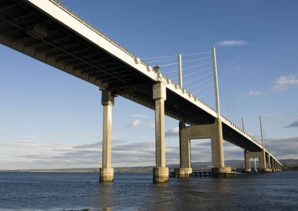 The Kessock Bridge, main, and the Grand Theft Auto game which may have inspired the bizarre stunt, below. Picture: Getty