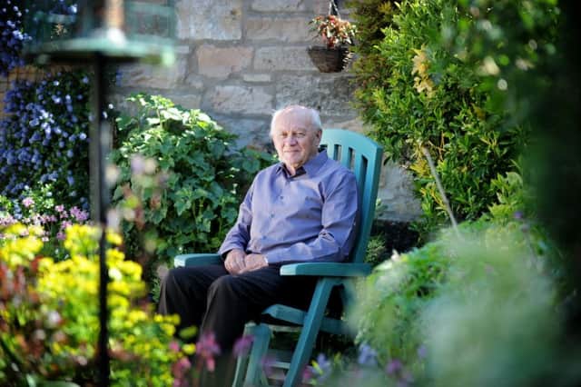 Doug Moran relaxes in his garden at home in Inveresk, East Lothian. Picture: Jane Barlow