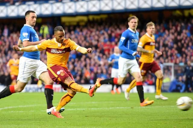 Lionel Ainsworth scores his side's third goal of the first leg. Picture: SNS
