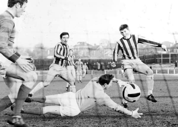 Kenny Dalglish, then just 16, scores for Cumbernauld United at Guys Meadow in 1967. Picture: Johnston Press