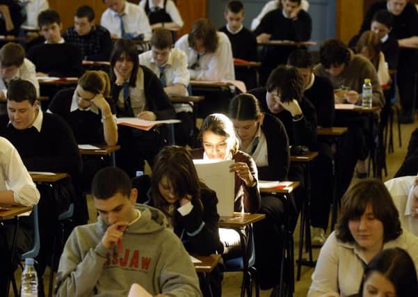 Pupils sit a preliminary maths exam at Williamwood High School, Glasgow. Picture: TSPL