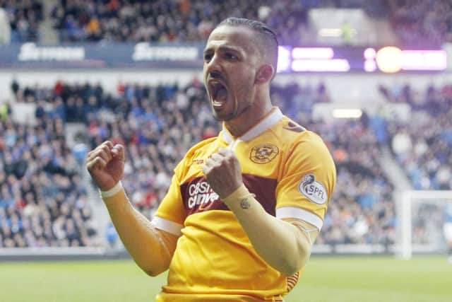 Motherwell's Lionel Ainsworth celebrates his goal. Picture: PA