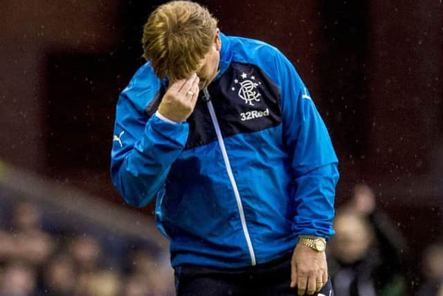 Rangers manager Stuart McCall cuts a dejected figure at full-time. Picture: SNS