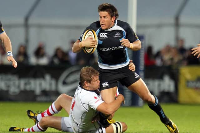 Glasgow Warriors' DTH van der Merwe is tackled by Ulster's Niall O'Connor