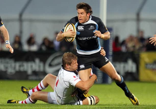Glasgow Warriors' DTH van der Merwe is tackled by Ulster's Niall O'Connor