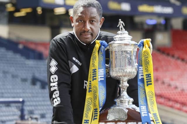 Inverness assistant manager Russell Latapy with the Scottish Cup. Picture: Steve Welsh