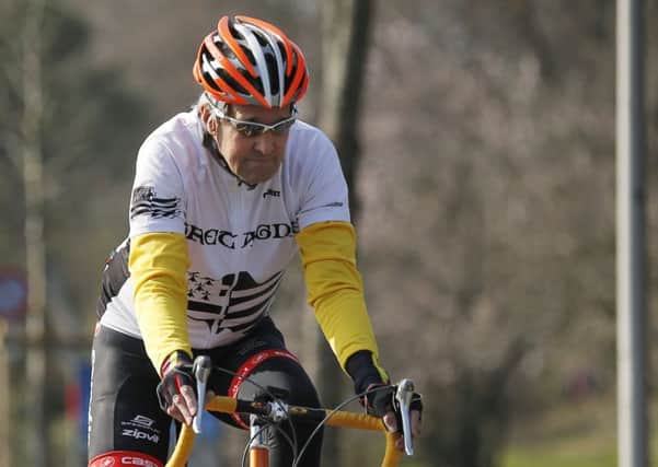 Kerry often takes his bike on foreign trips and breaks up negotiations with cycle rides to wind down. Picture: AP