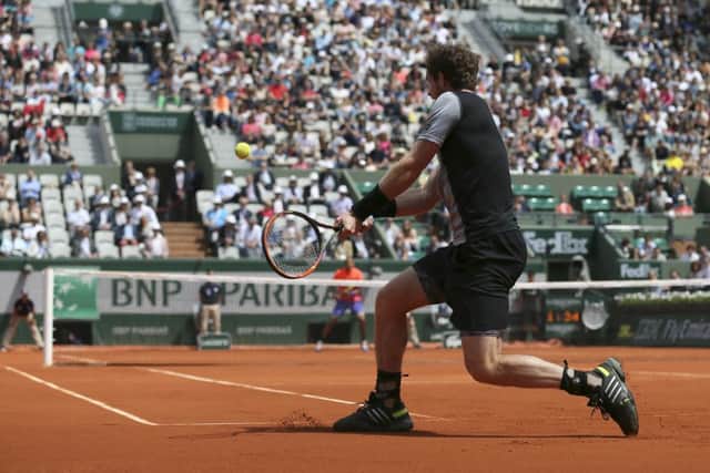 Andy Murray returns the ball to Australia's Nick Kyrgios during their third round match of the French Open. Picture: AP