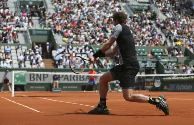 Andy Murray returns the ball to Australia's Nick Kyrgios during their third round match of the French Open. Picture: AP