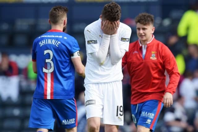 Dejection for Falkirk's Luke Leahy at full-time. Picture: SNS