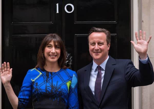 David Cameron and wife Samantha on the doorstep of No 10 after the Conservatives success in last months general election. Picture: Getty