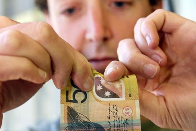 An Australian polymer note proves untearable. Picture: Getty
