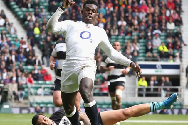 Christian Wade, of England, breaks clear of Tusi Pisi at Twickenham. Picture: Getty