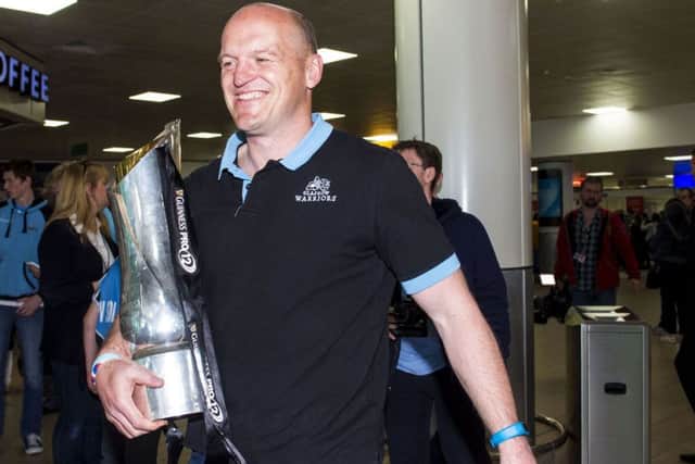 Glasgow Warriors Head Coach Gregor Townsend arrives in Glasgow with the Guinness PRO12 trophy. Picture: SNS