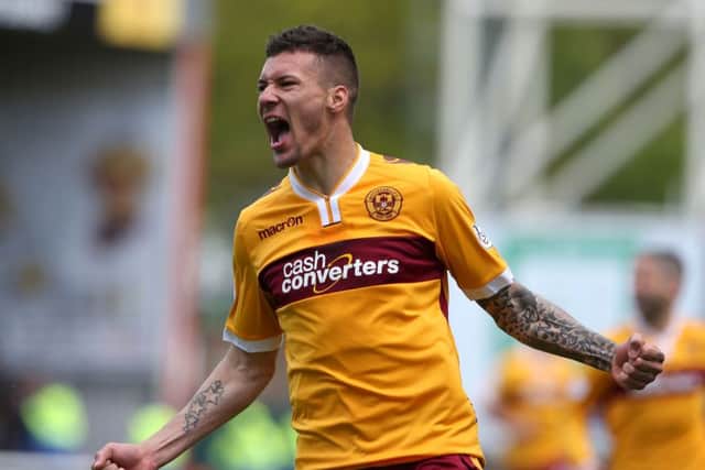 Motherwell's Marvin Johnson celebrates scoring his side's first goal. Picture: PA