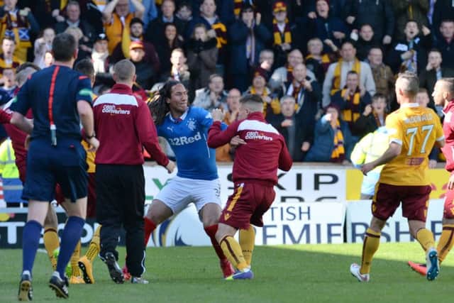 Rangers' Bilel Mohsni (centre) clashes with Motherwell players. Picture: SNS