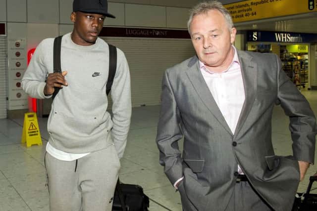 Celtic scout John Park (right) joins target signing Dedryck Boyata as he arrives in Glasgow. Picture: SNS