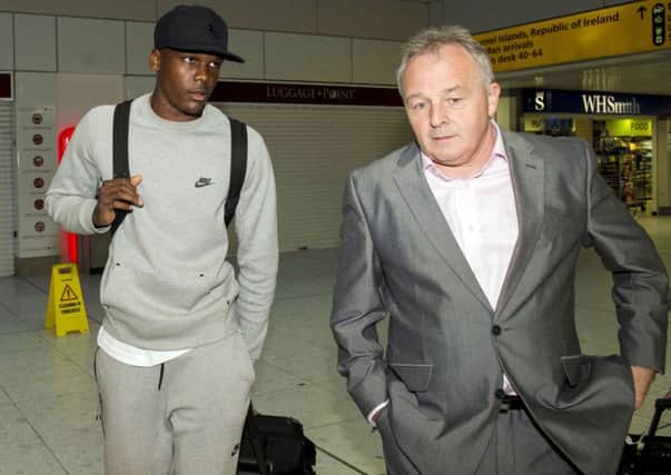 Celtic scout John Park (right) joins target signing Dedryck Boyata as he arrives in Glasgow. Picture: SNS