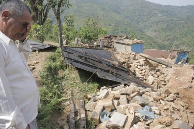 A man contemplates the aftermath of the earthquake in Gorkha, Nepal. Picture: AFP