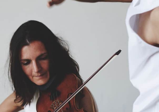Scottish Ensemble violinist Cheryl Crockett, in 
rehearsal with Paul Pui Wo Lee 
of Andersson Dance for the collaborative performance of the Goldberg 
Variations. Picture: Contributed