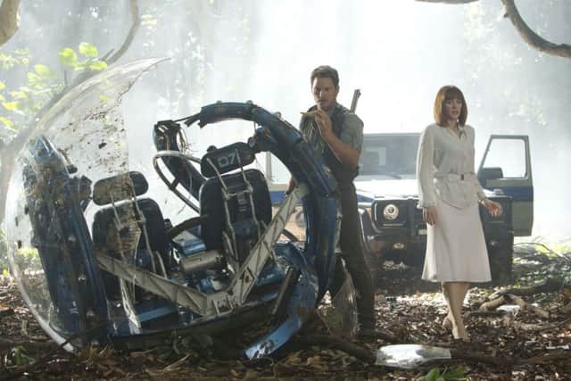 Chris Pratt as Owen Brady and Bryce Dallas Howard as Claire Dearing in Jurassic World