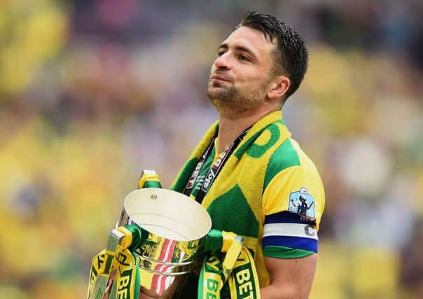 Russell Martin lead Norwich to victory in the Championship play-off final. Picture: Getty