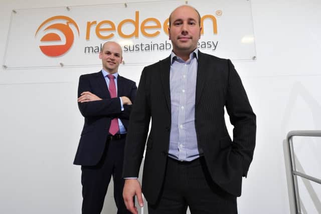 Andrew Sloan from the Bank of Scotland, left, with Redeems finacial officerOliver Tedcastle  Picture: Chris Watt Photography