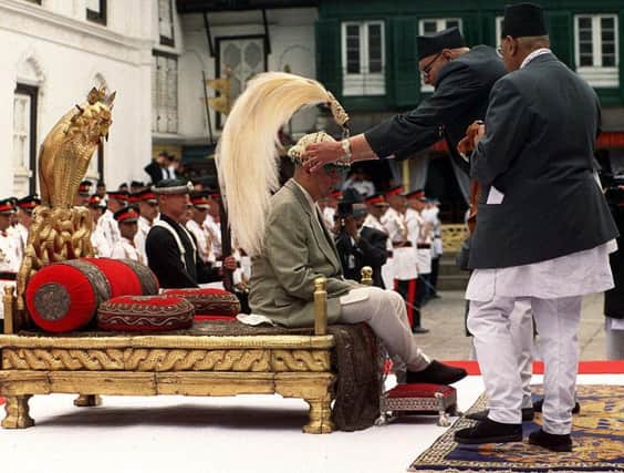 King Gyanendra (L) is crowned as new King of Nepal at Hanuman Dhoka in Kathmandu. Picture: AFP/Getty